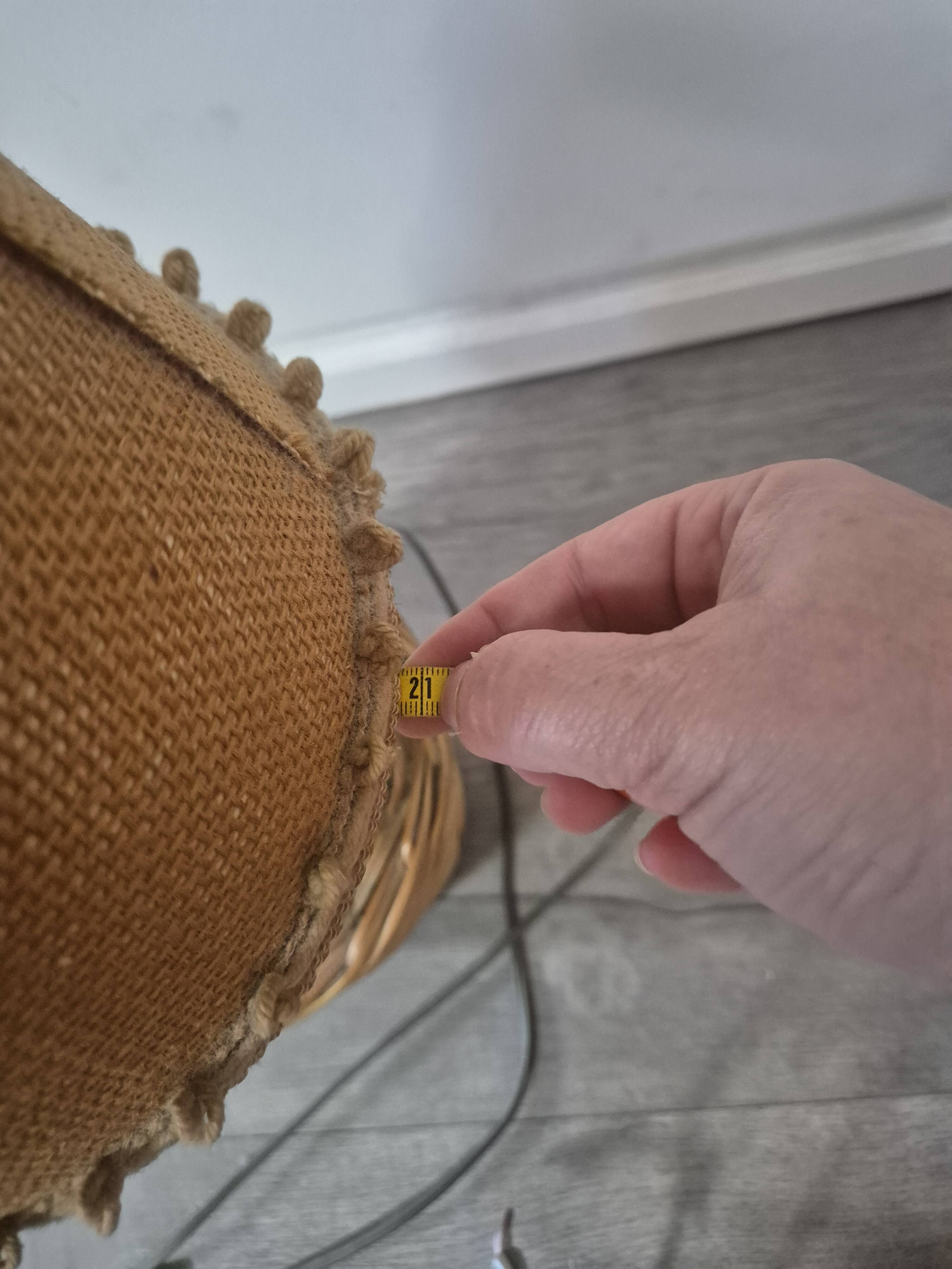 vintage table lamp dame jeanne covered in rattan wicker with a handle