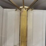 Gold-plated brass magazine rack Maison Baguès