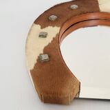 Vintage 1970s cowhide horseshoe mirror