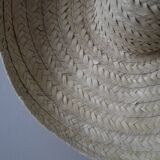 Hand-woven wicker straw hat, ethnic decoration object, sombrero, handmade