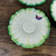 Set of 3 antique Lunéville butterfly saucers / saucers in barbotine.