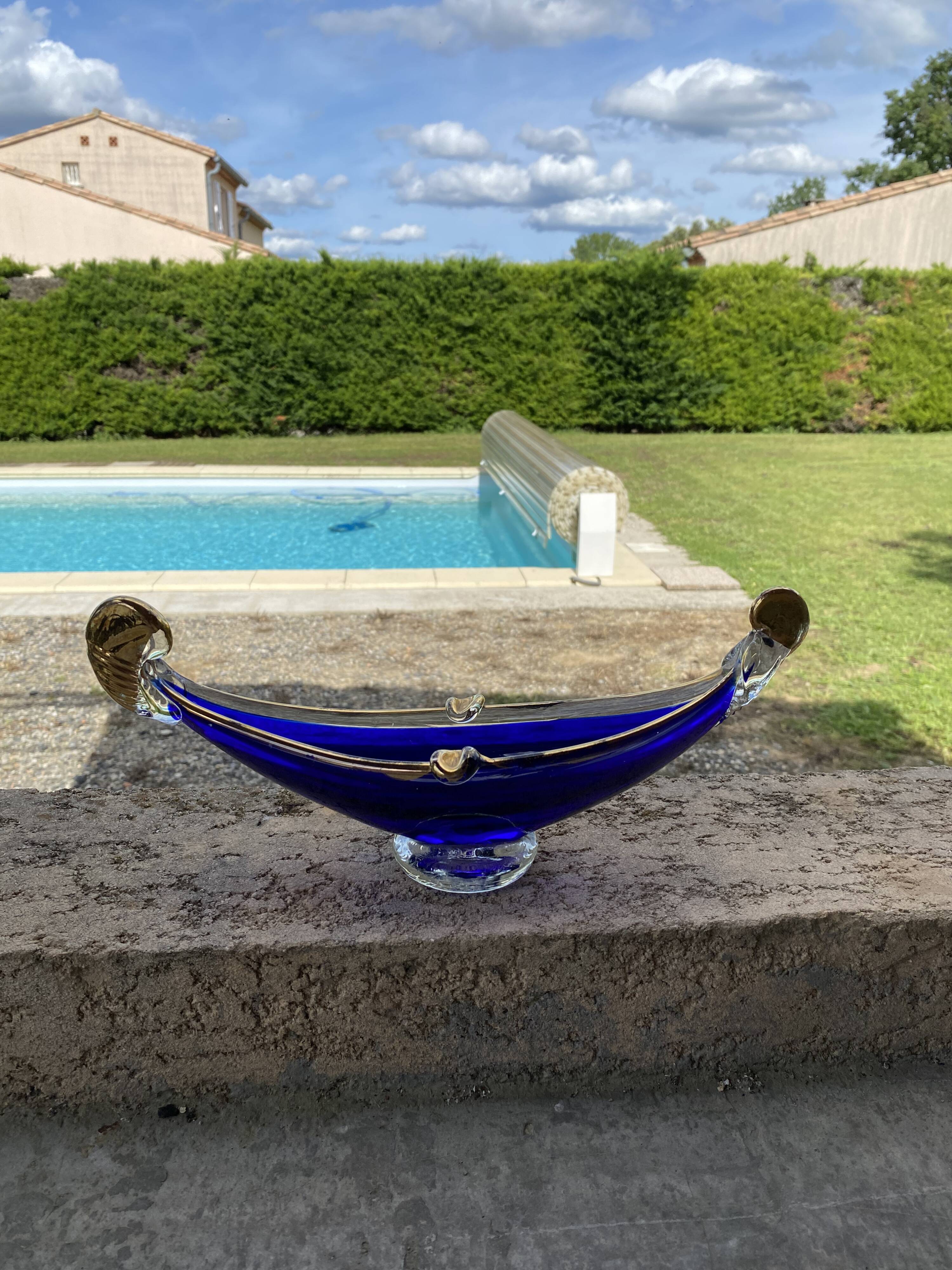 Vintage cobalt blue Murano glass gondola bowl with gilding.