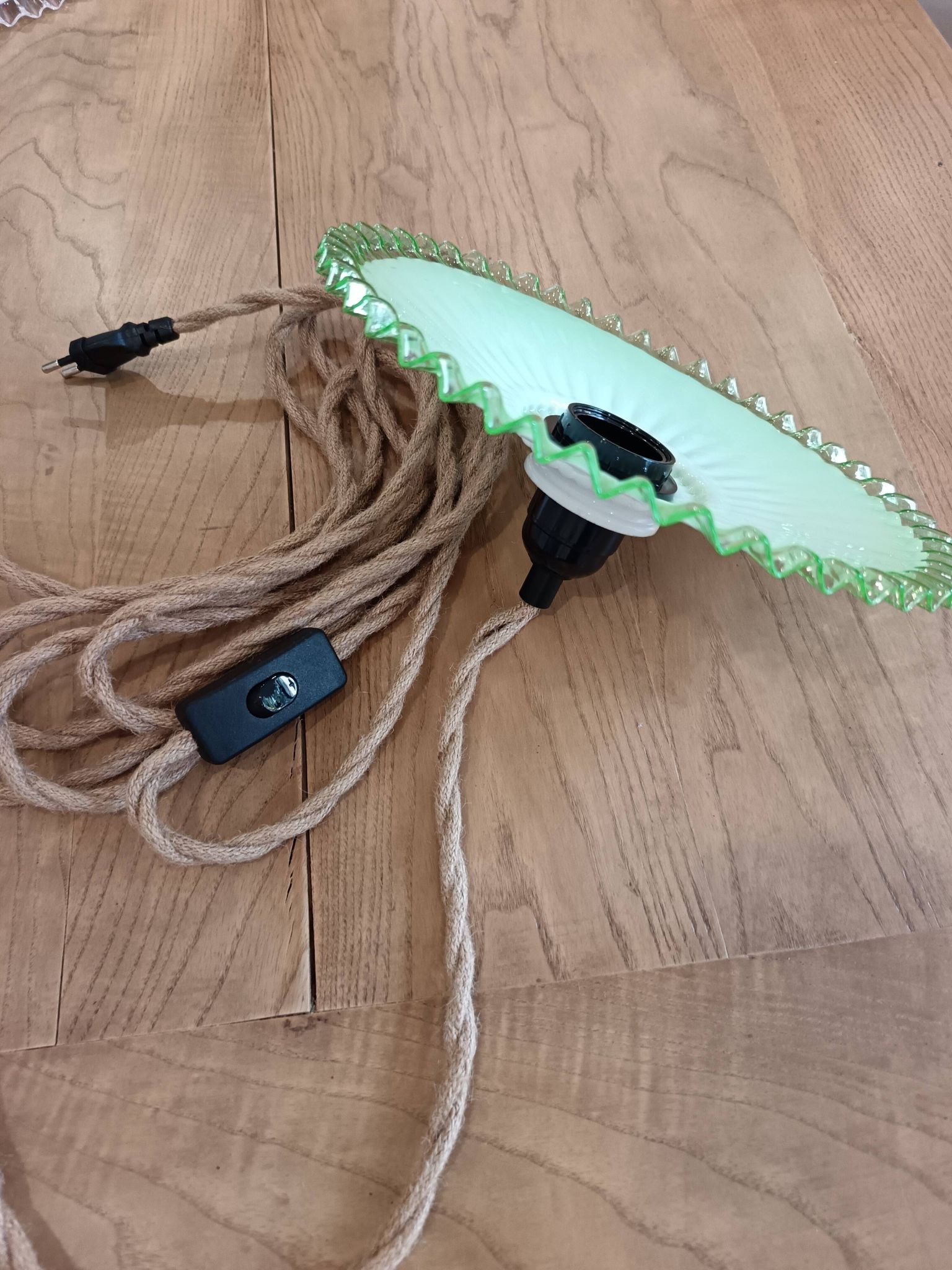 Portable lamp in pale green and white glass