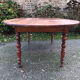 Antique cherry wood farmhouse table with rounded ends