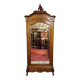 Armoire a glace de style Louis XV, en noyer sculpté