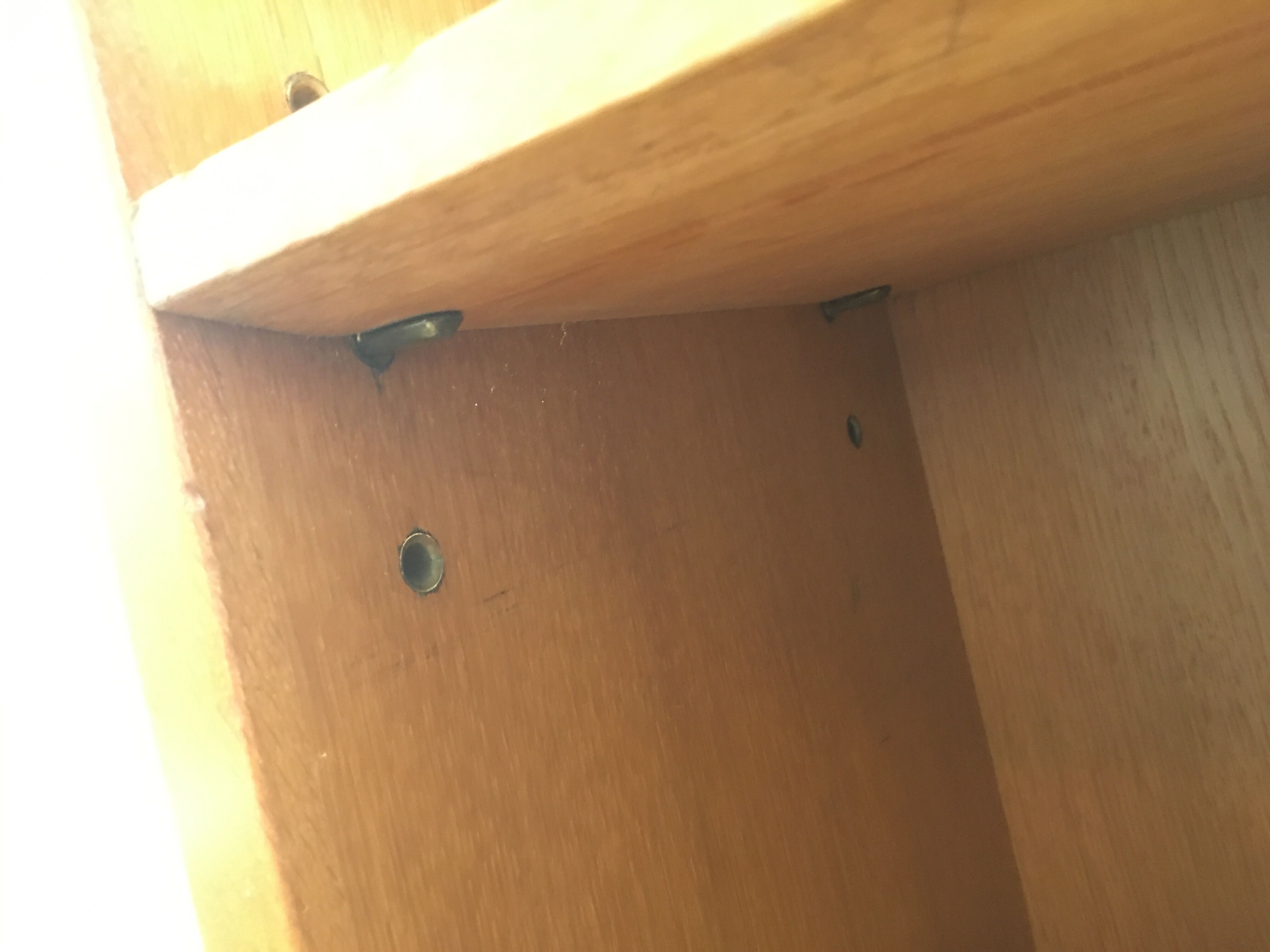 Oak bookcase with brass clogs, 60's