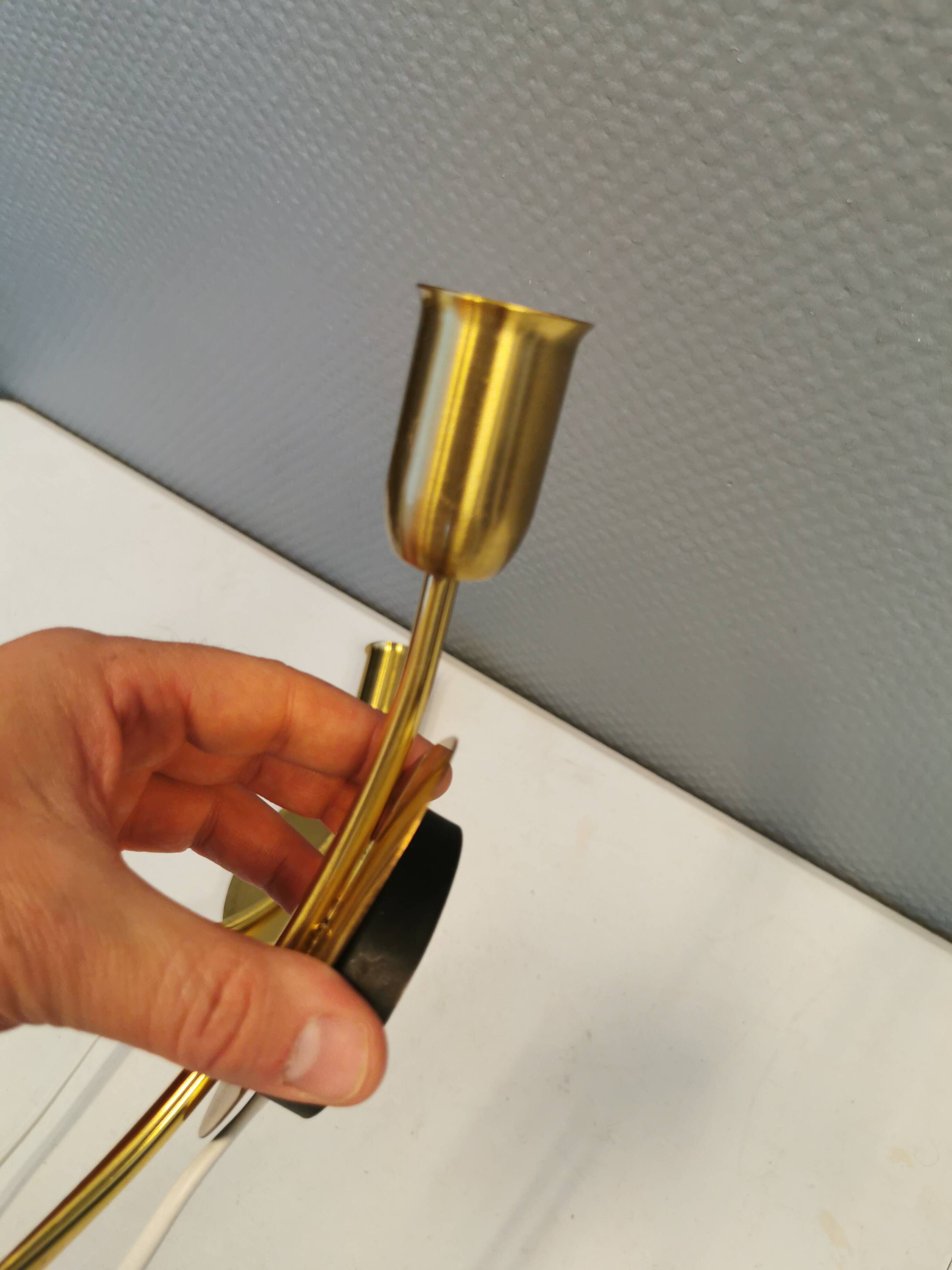 A set of "tulip" wall lamps in golden colored metal. Danish 1970-80s