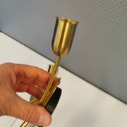 A set of "tulip" wall lamps in golden colored metal. Danish 1970-80s