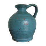Sandstone pitcher painted in turquoise, very old pottery