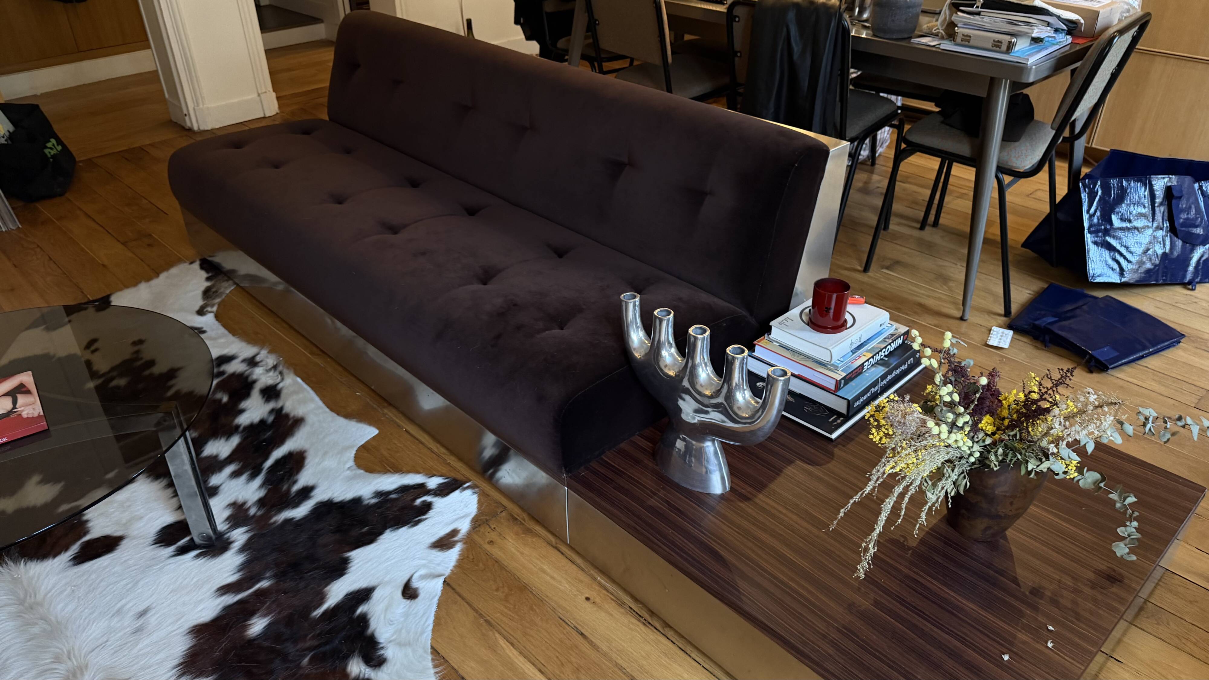 Red Edition Stanley 3-seater sofa with matching chocolate velvet storage.