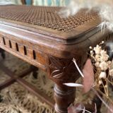 Piano bench seat in cane