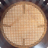 Colonial "Art Deco" armchair in wood and cane.