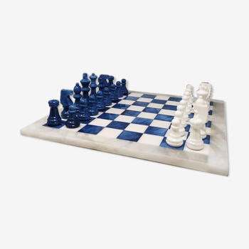 Jeu d’échecs bleu et blanc en albâtre volterra fait à la main. fabriqué en italie