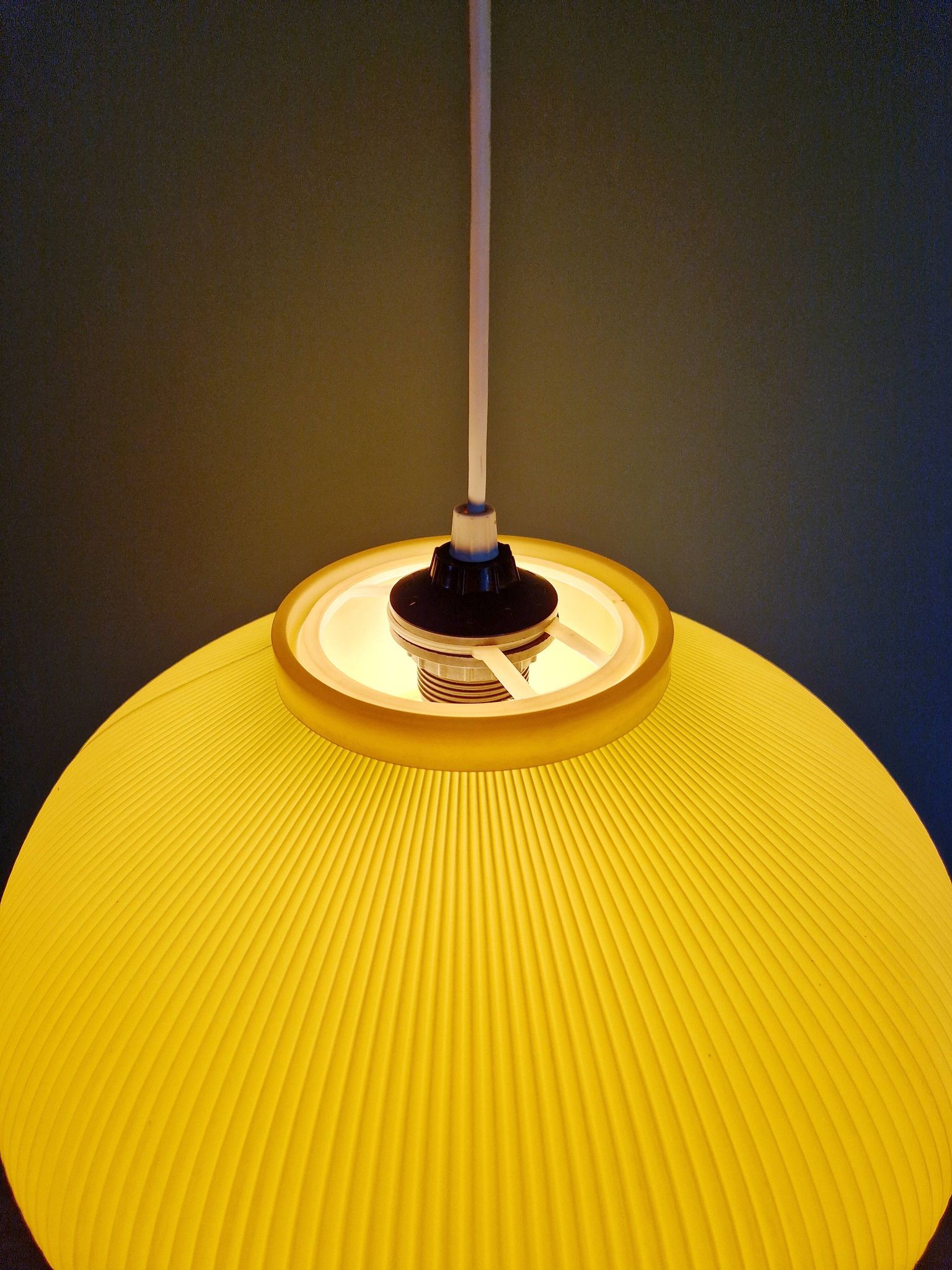 Vintage oval-shaped suspension in pleated celluloid, light green colour, 1960.