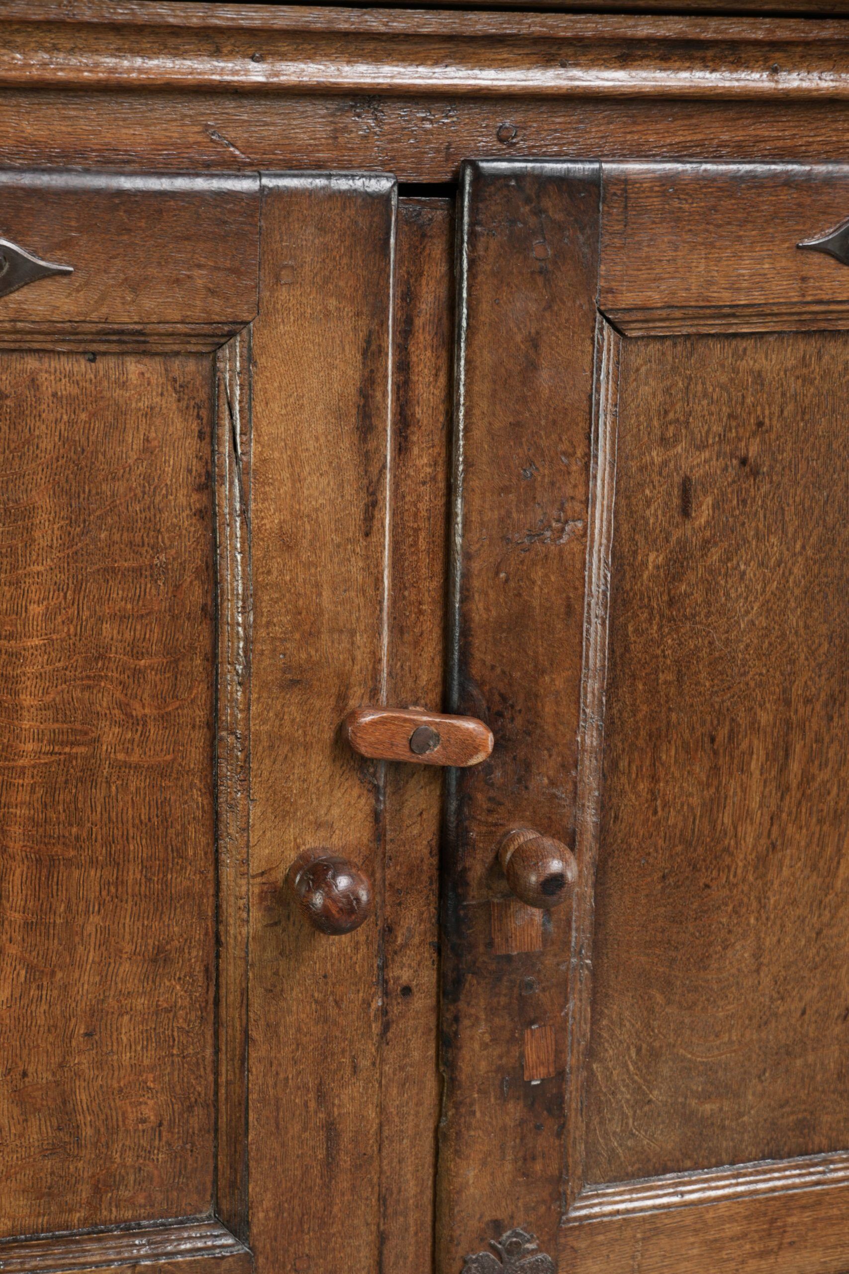Antique oak farmhouse cupboard from the 17th century with original fittings