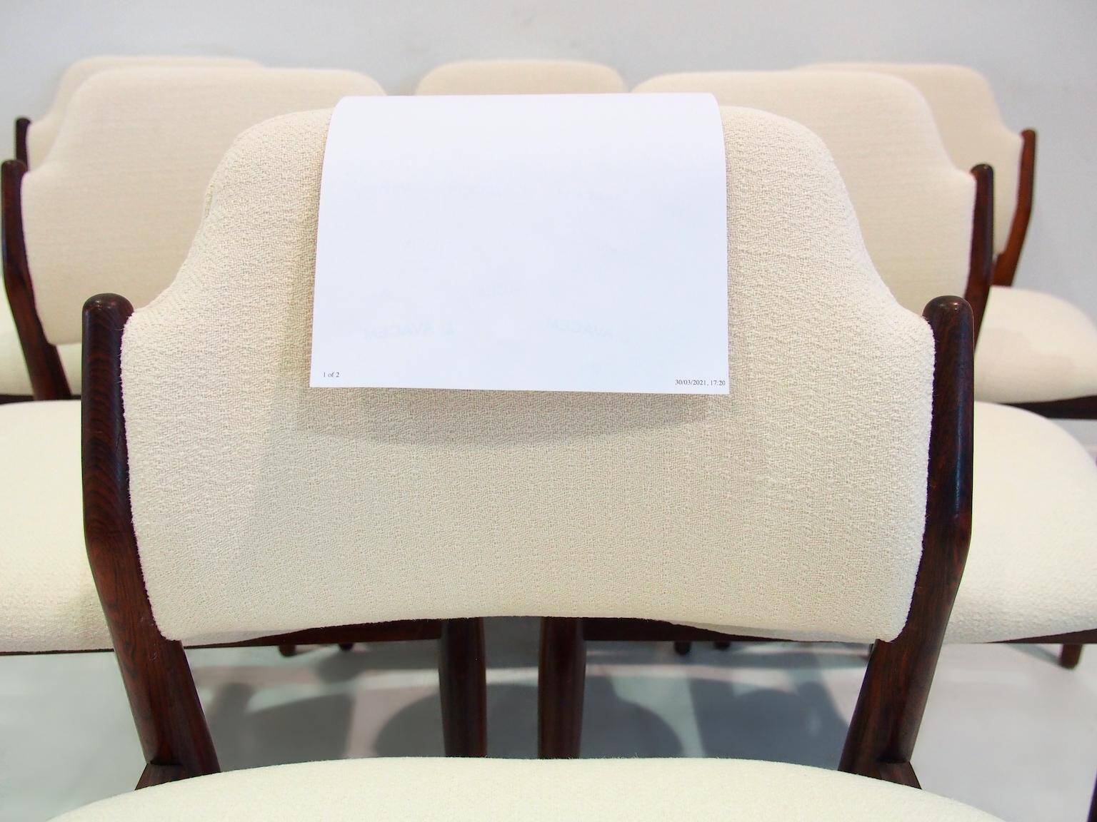 Set of six hardwood chairs by Arne Vodder for Sibast with white textile upholstery.