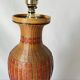 Vintage 1970s Chinese lamp base in woven bamboo on a porcelain vase