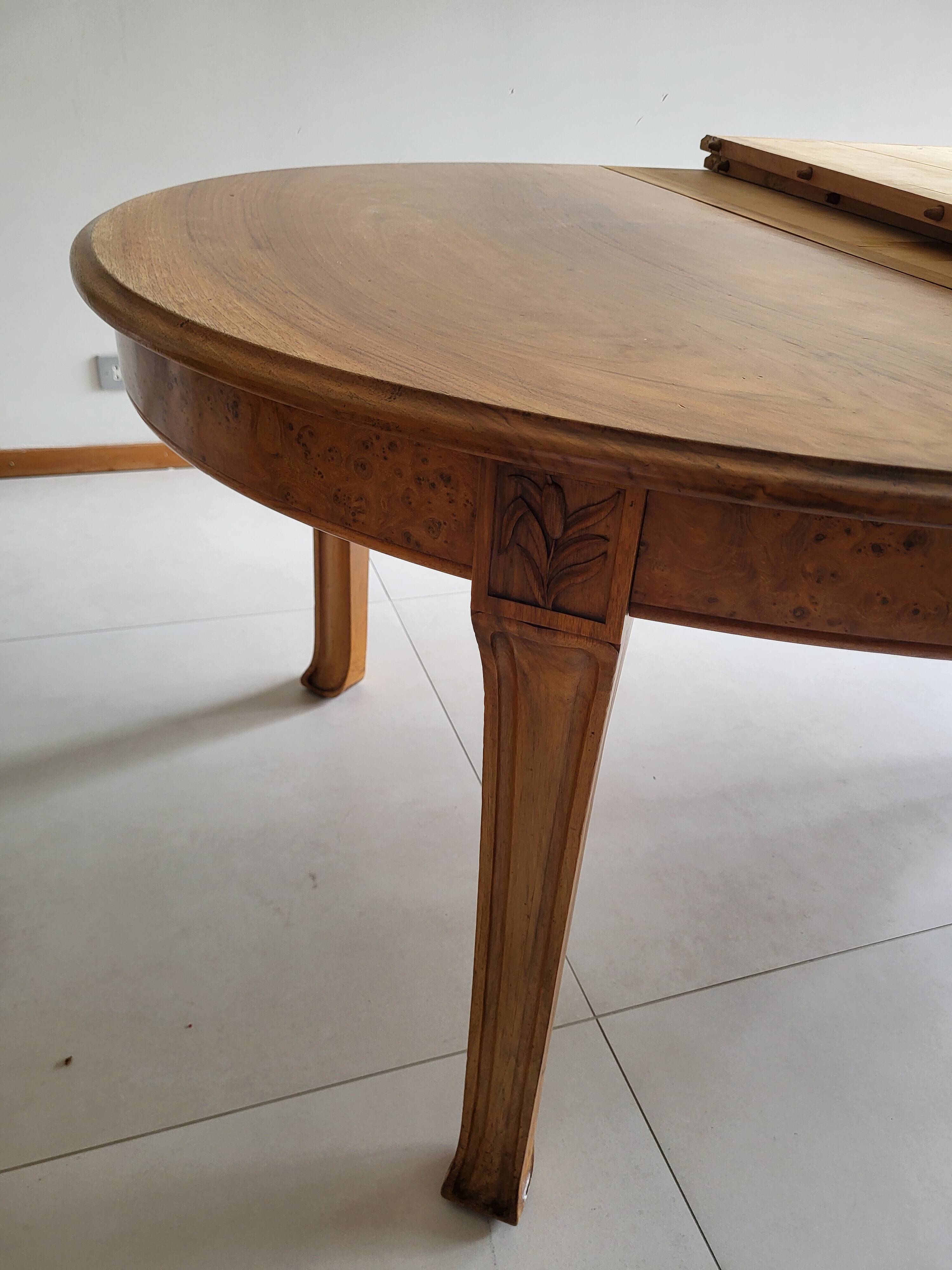 Table and 10 Art Nouveau style chairs.