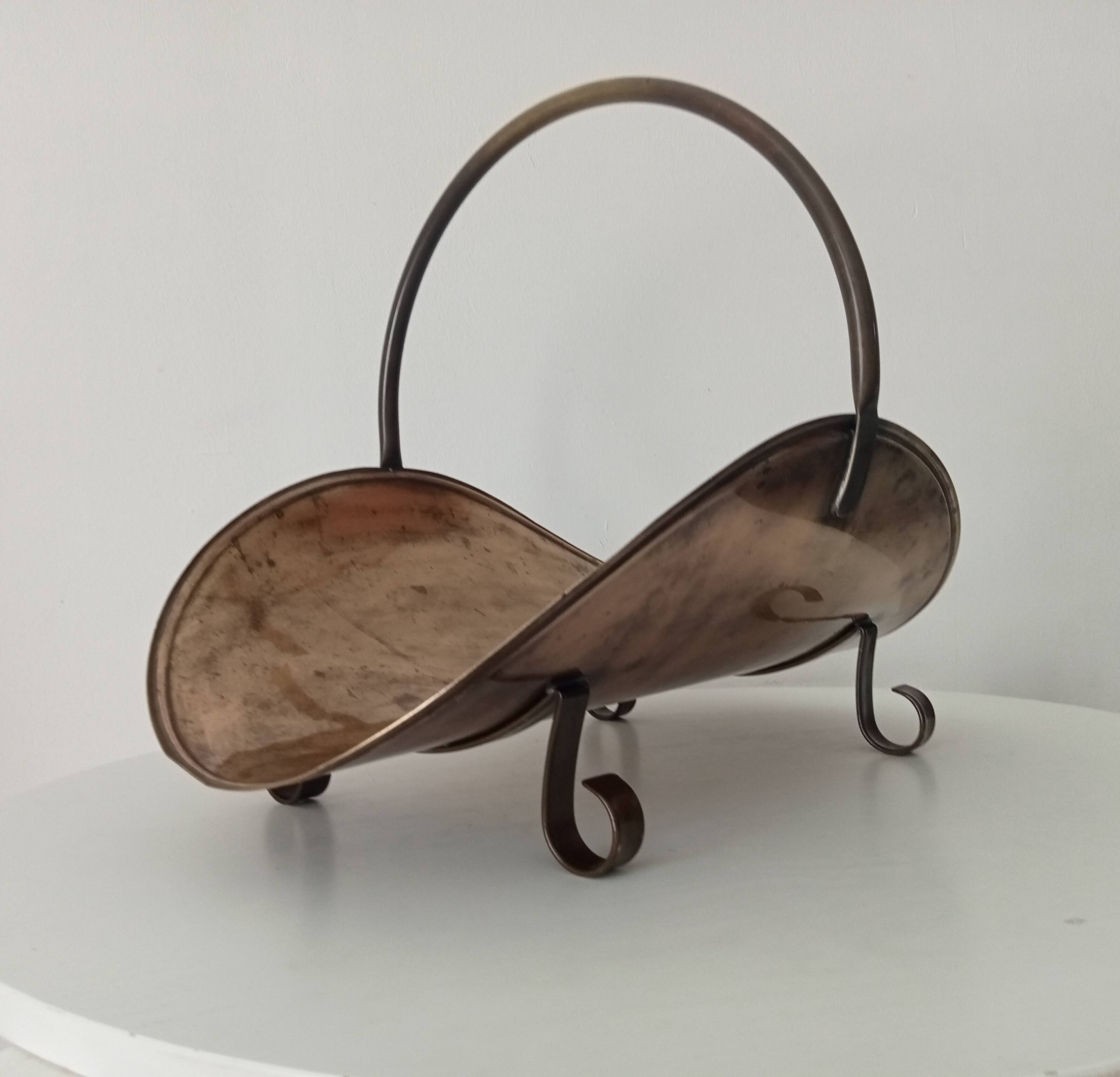 Old brass log holder