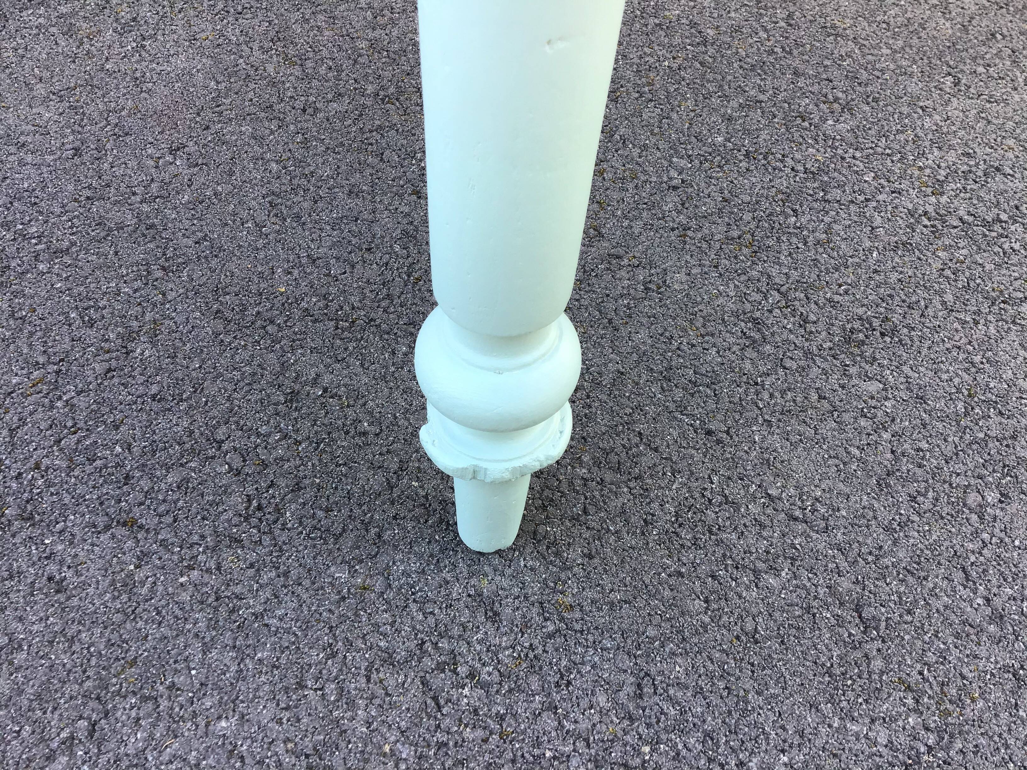 Dining table with painted legs