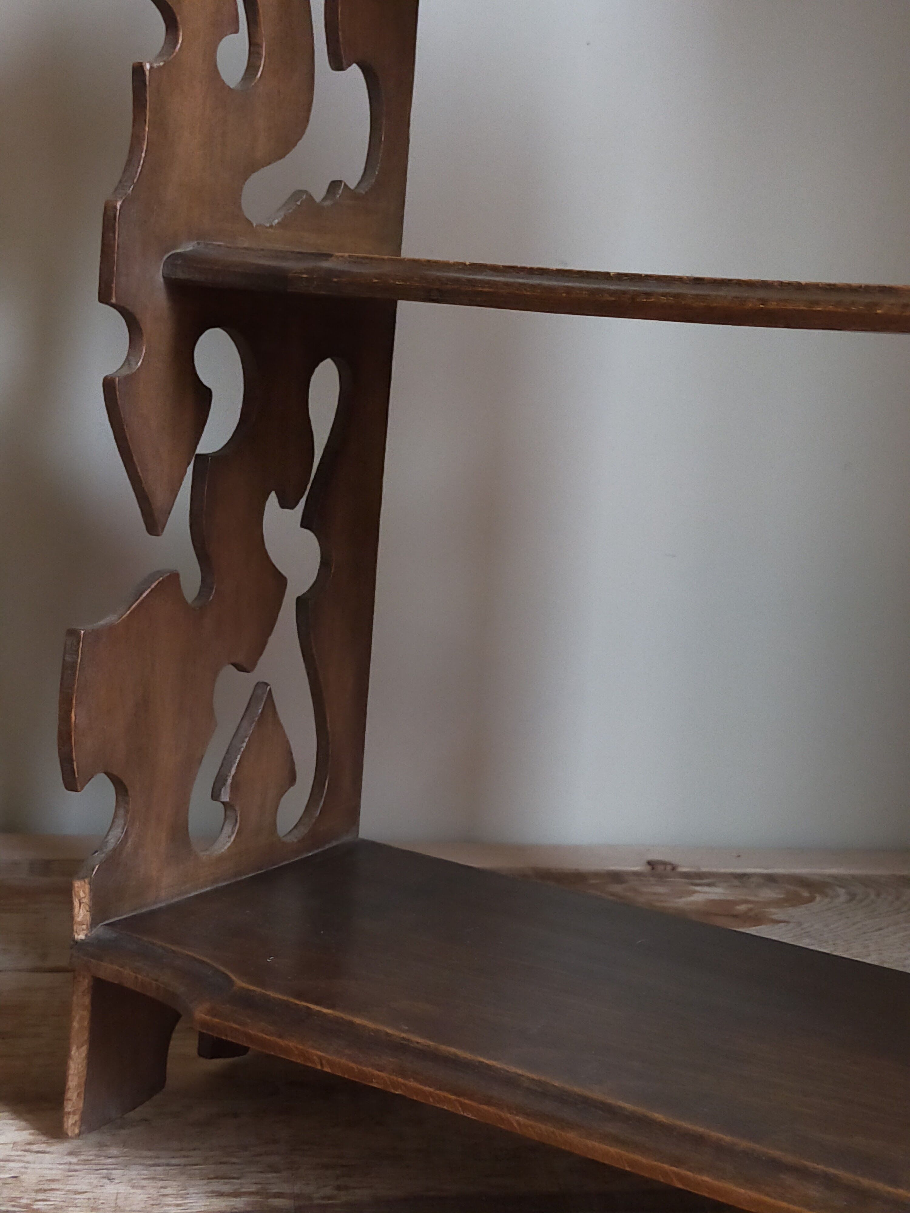 Old carved wooden wall shelf