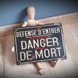 Plate embossed trespassing