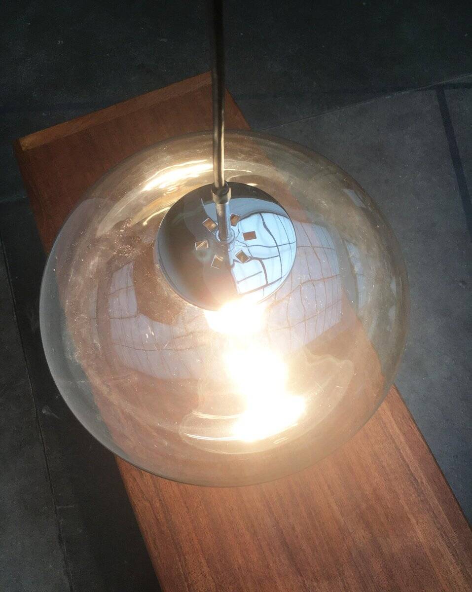 Suspended UFO-shaped glass luminaires in mid-century German Space Age style, set of 3.