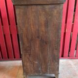 India. Bonnetière with a teak door finely carved by hand.