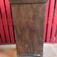 India. Bonnetière with a teak door finely carved by hand.