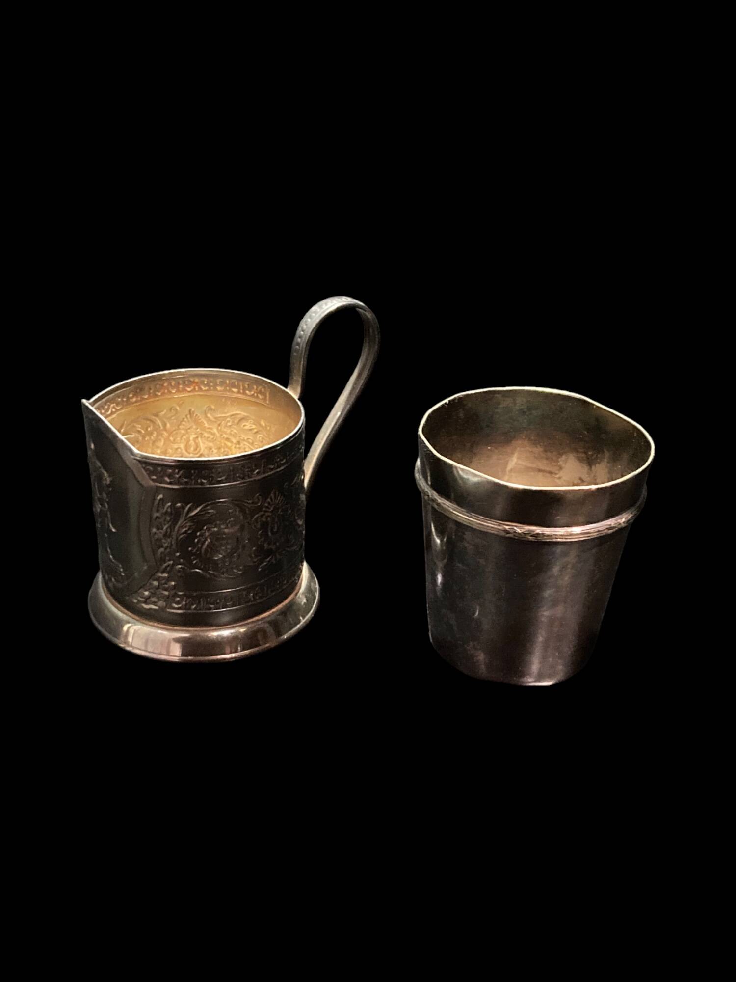 Two silver-plated glasses