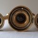 Lot of three old brass candlesticks