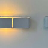 Pair of vintage wall lights, curved white metal, France 1980