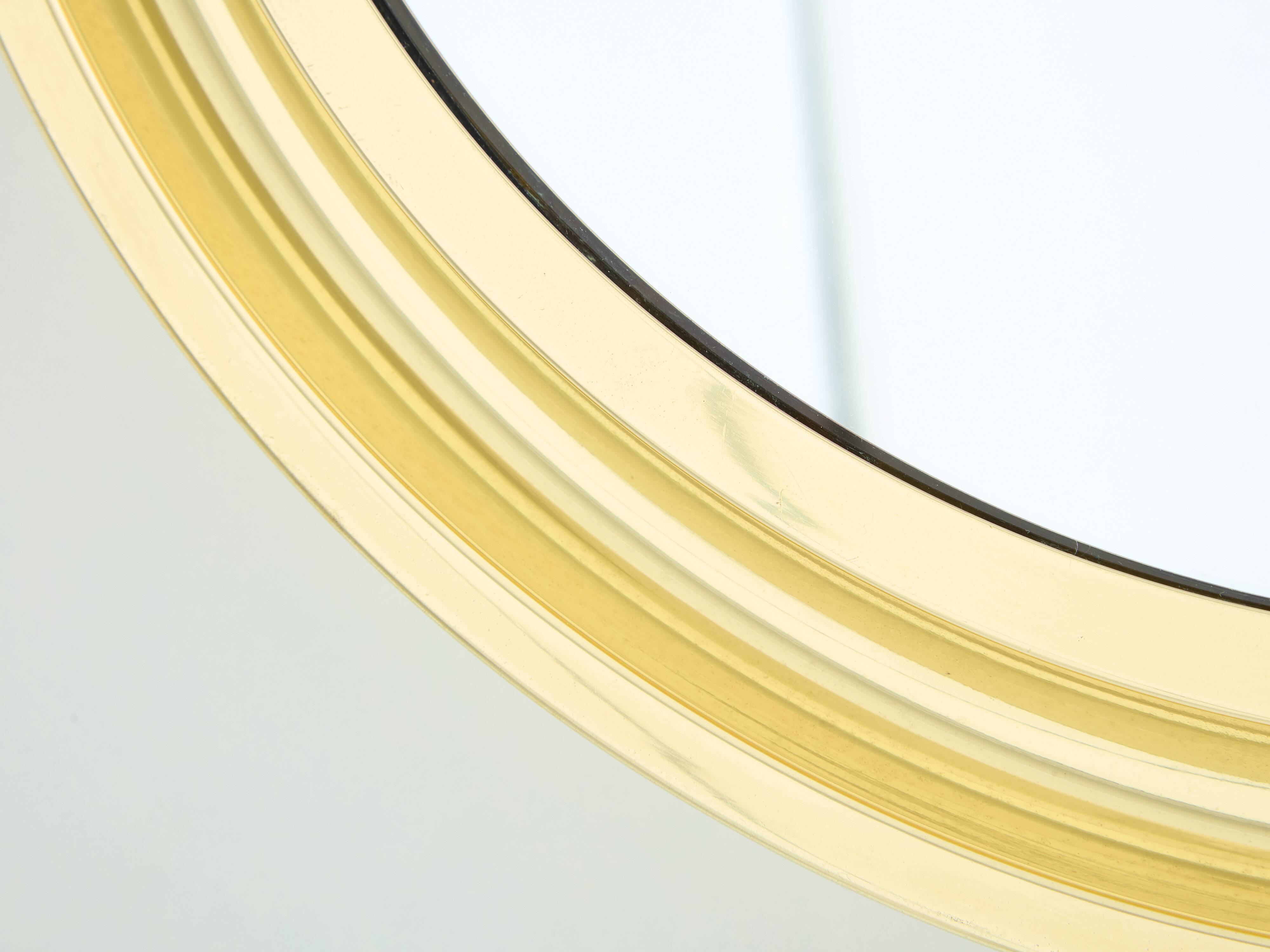 Round brass mirror by Sergio Mazza for Artemide 1960s