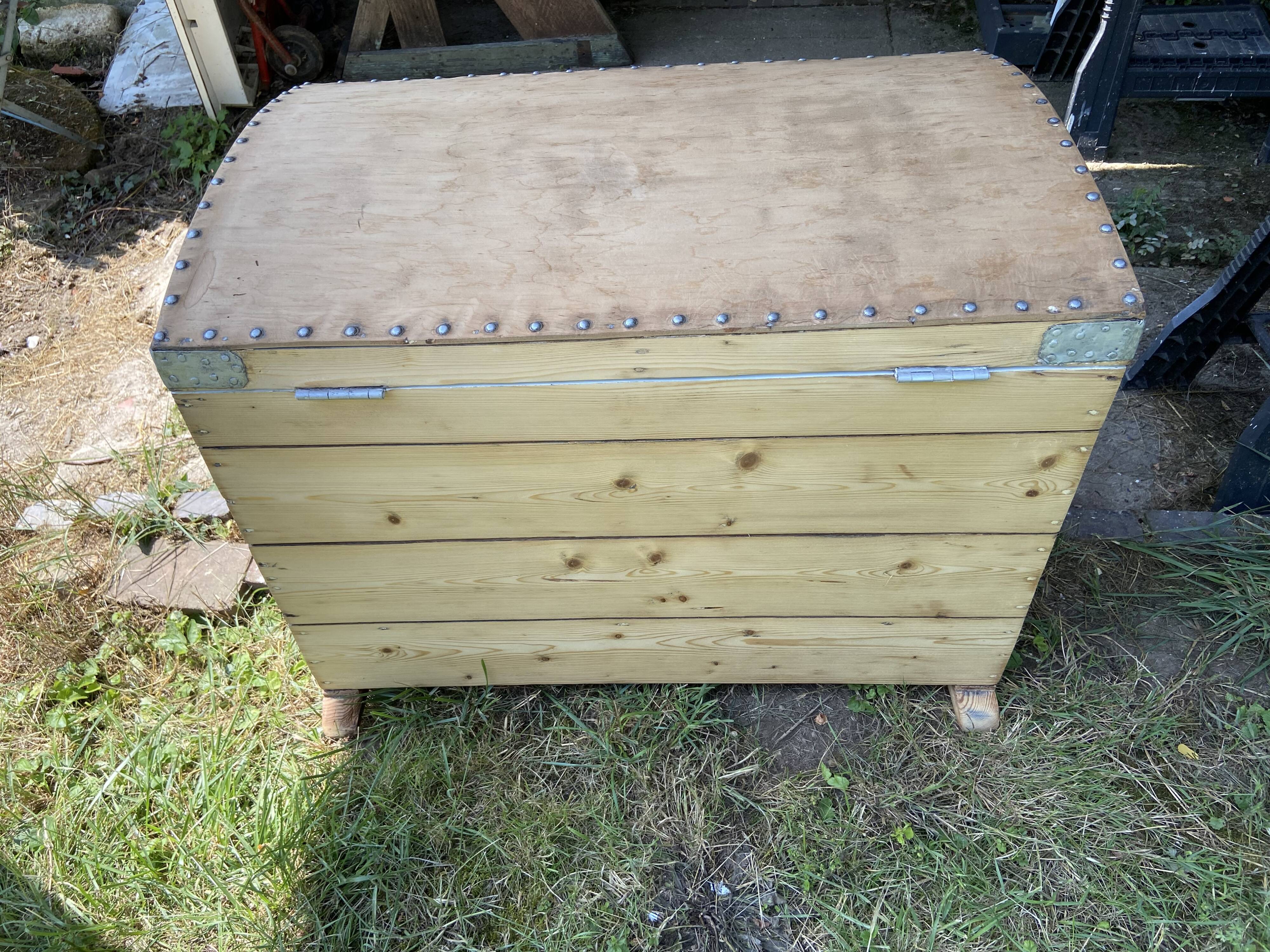 Raw wooden chest with a secret drawer