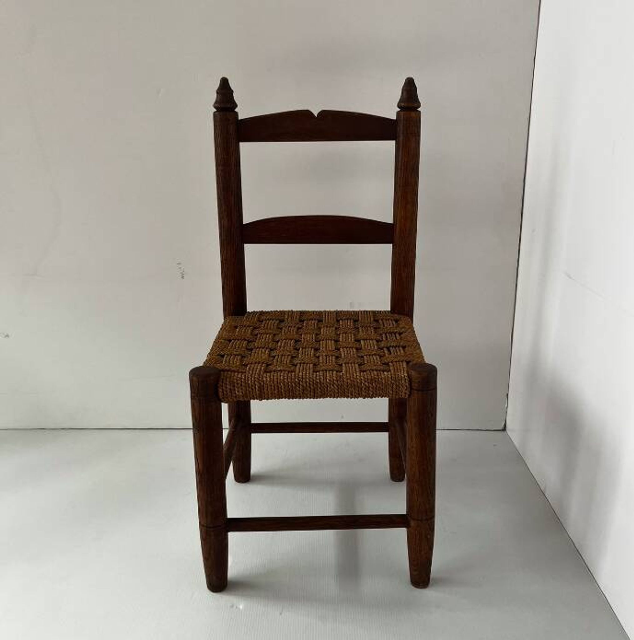 Child's chair made of wood and rope