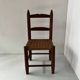 Child's chair made of wood and rope
