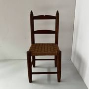 Child's chair made of wood and rope