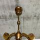 Art Nouveau chandelier with three arms and opalescent iridescent glass.