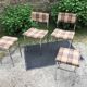 Vintage chairs and stools with chrome-plated square tubular metal base.