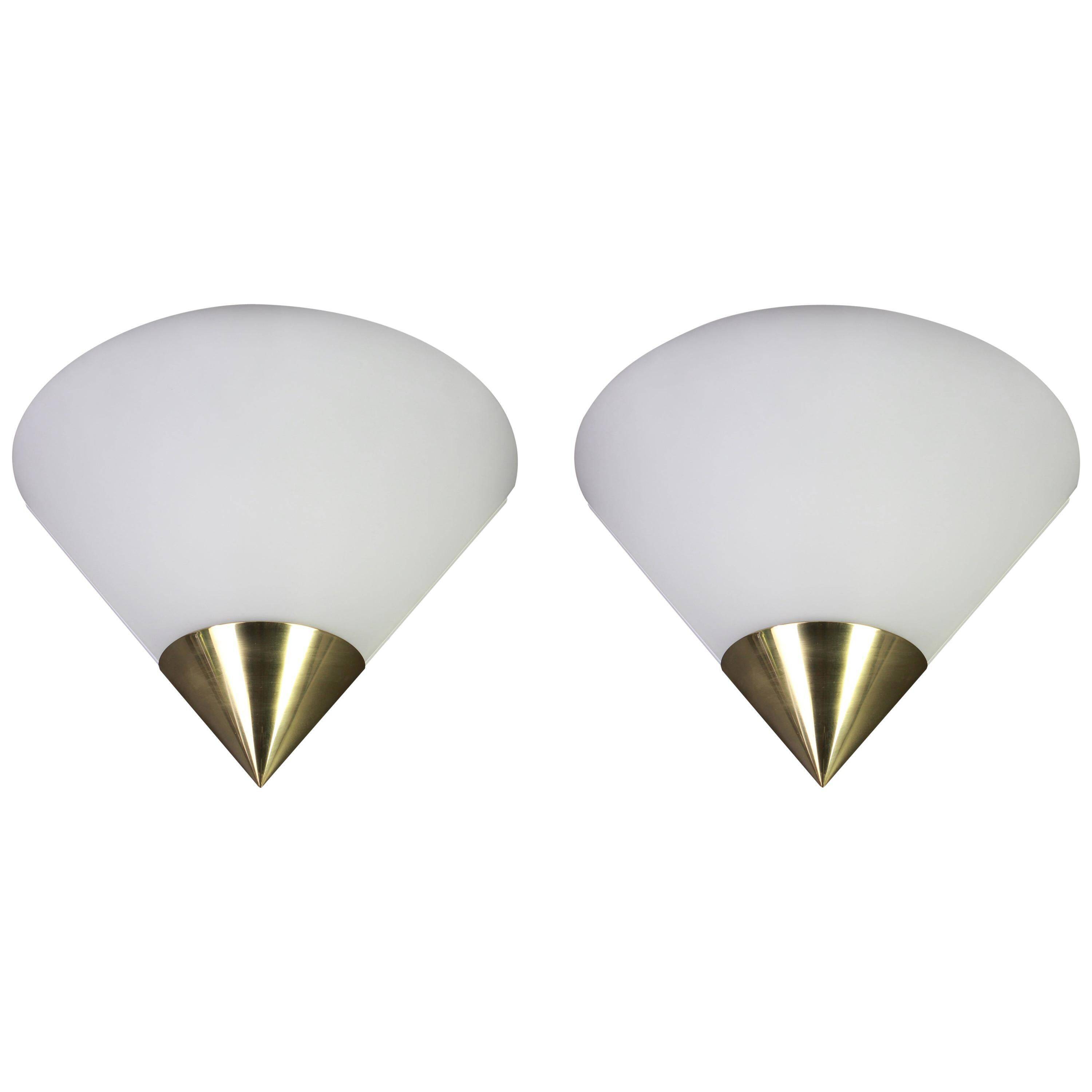 Pair of opaline glass wall lights designed by Limburg, Germany.