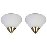 Pair of opaline glass wall lights designed by Limburg, Germany.