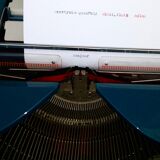 Erika portable typewriter with her briefette - notice and accessories