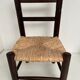 Wooden children's chair with vintage straw seat