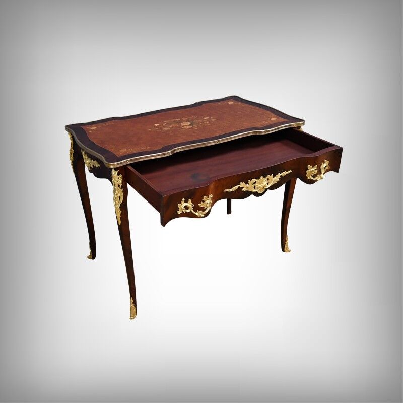 Rosewood, mahogany, and rosewood desk-table, Louis XV style – early 20th century.