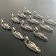 12 metal duck-shaped knife holders