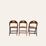 Set of 3 folding chairs in curved beech, circa 1930
