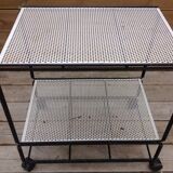Perforated iron rolling table