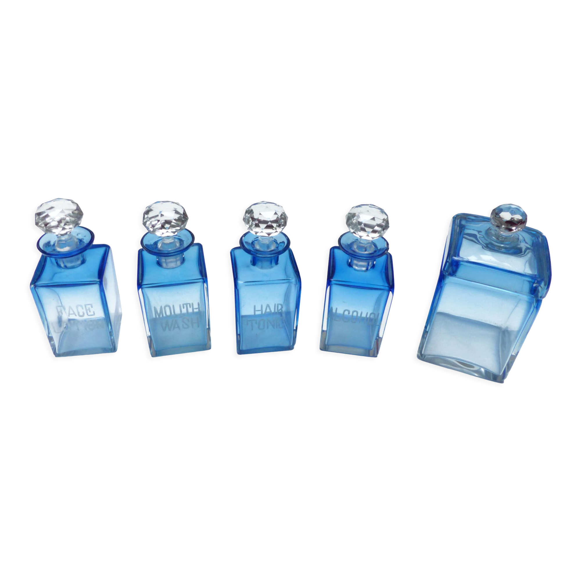 Set of 5 sapphire blue Bohemian crystal toilet bottles.