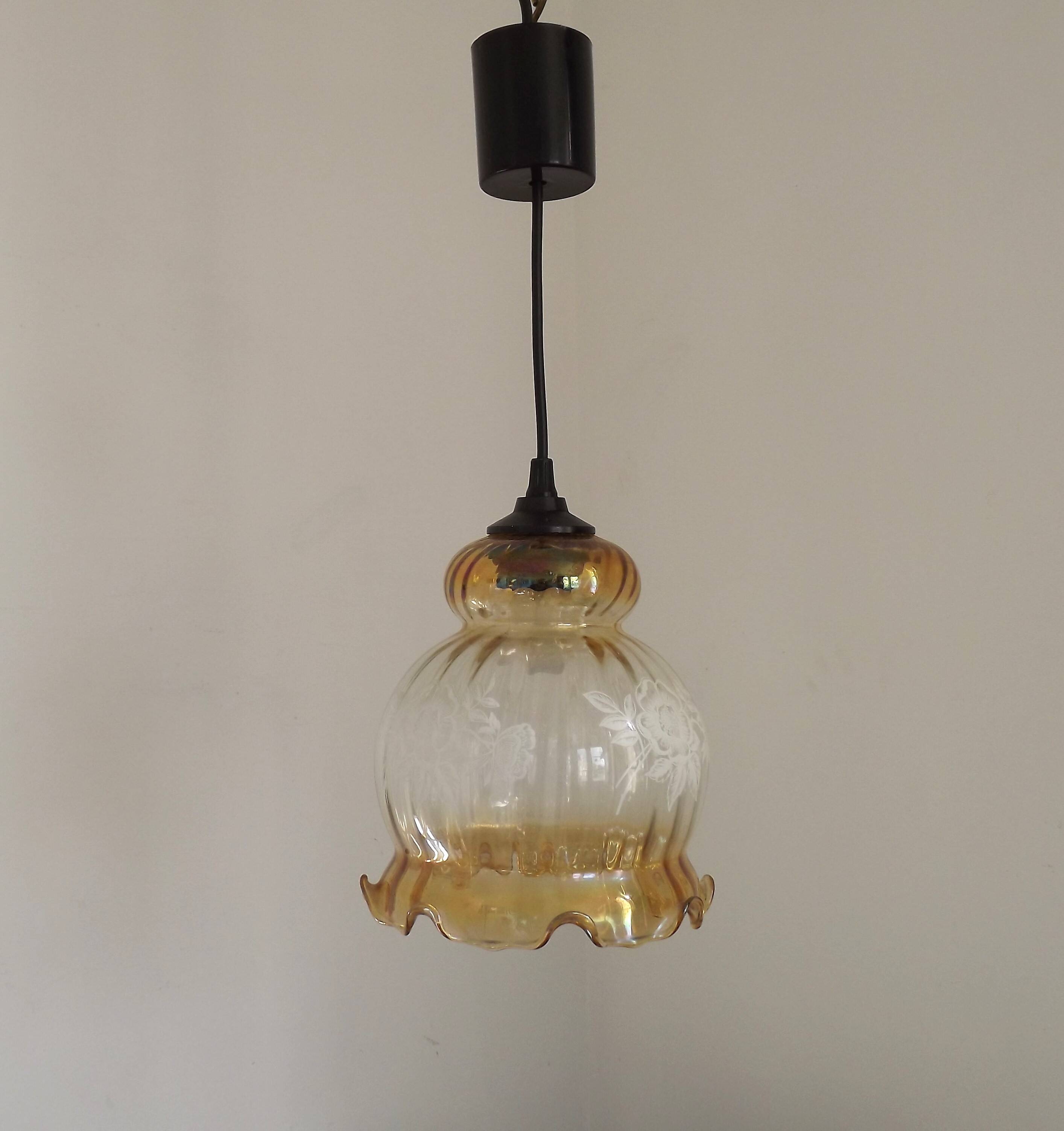 French vintage amber and clear glass ceiling light with white floral decoration.