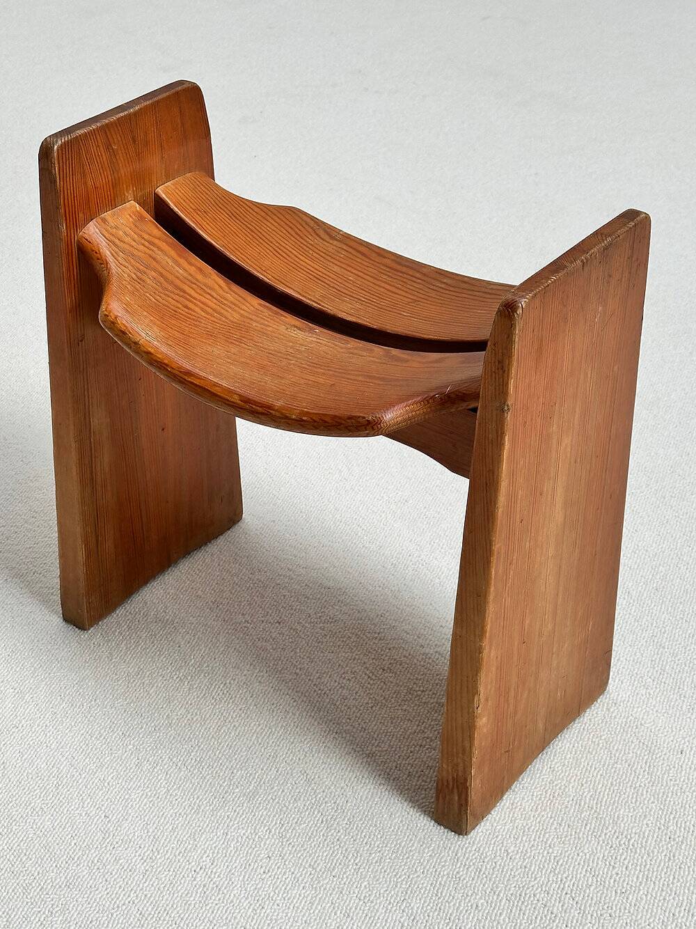 Iconic 'Jonte' stool in solid pine designed by Gilbert Marklund for Furusnickarn AB.